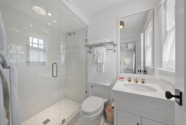 bathroom with vanity, toilet, walk in shower, and crown molding