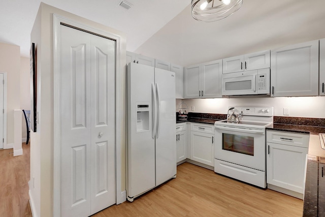 kitchen with white appliances, baseboards, visible vents, white cabinets, and light wood-style floors