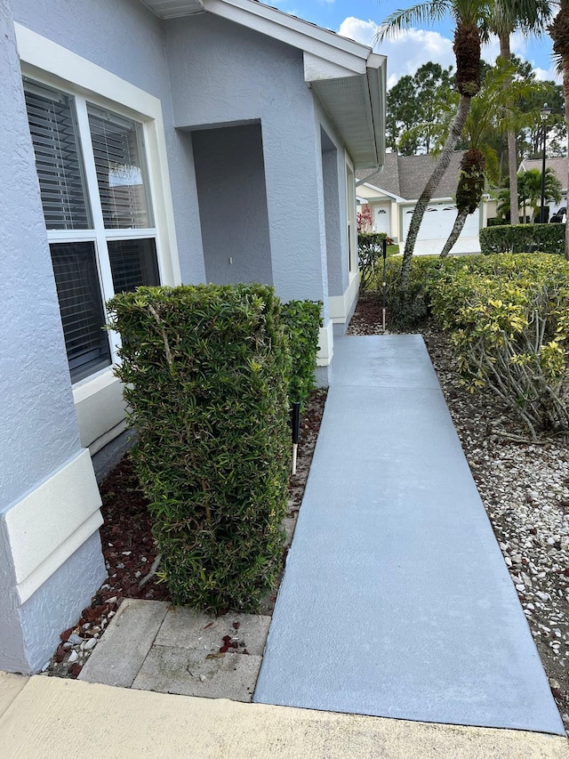 exterior space with stucco siding