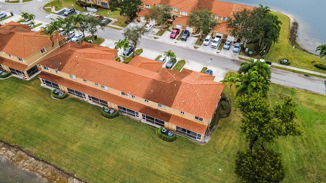 drone / aerial view featuring a water view