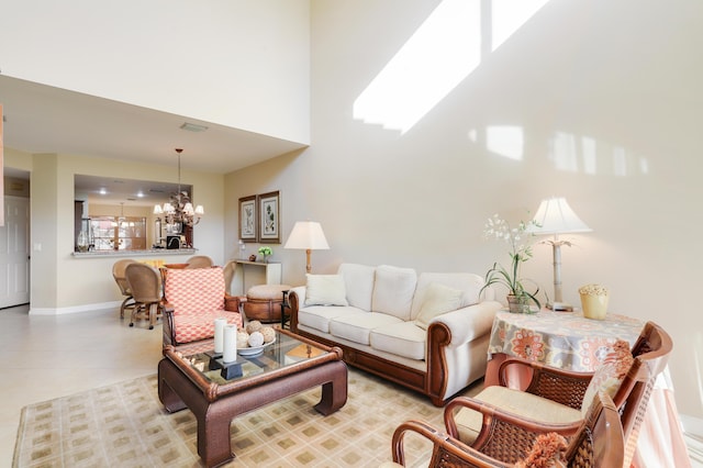 living room featuring a notable chandelier