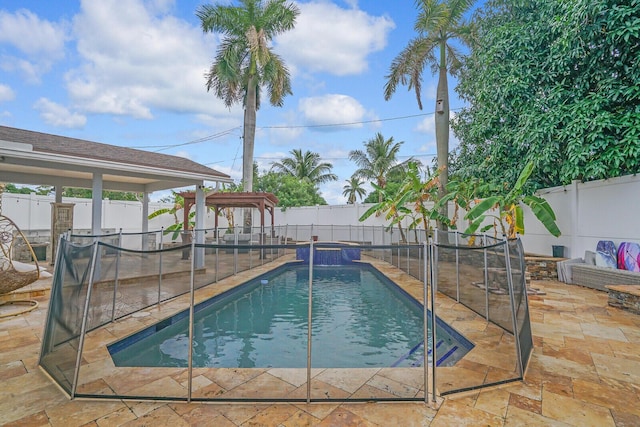 view of pool with a pergola, an in ground hot tub, and a patio