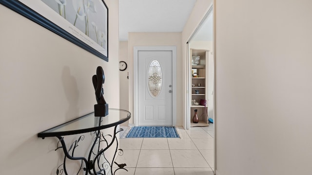 entrance foyer featuring light tile patterned floors