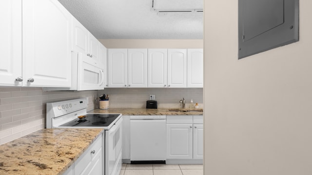 kitchen featuring white cabinets, white appliances, electric panel, and sink