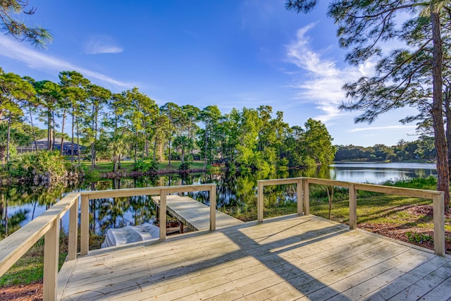 deck featuring a water view