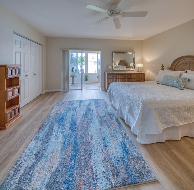 bedroom featuring a closet, light hardwood / wood-style floors, and ceiling fan