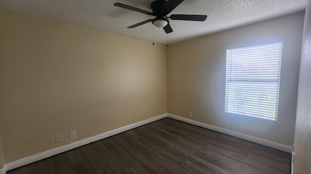 unfurnished room with a textured ceiling, dark hardwood / wood-style flooring, and ceiling fan