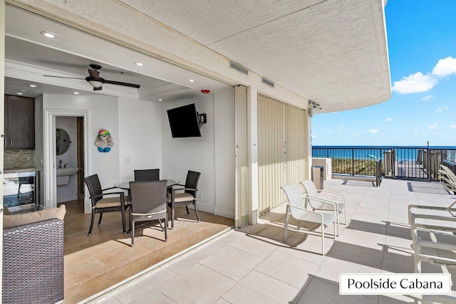 view of patio with ceiling fan