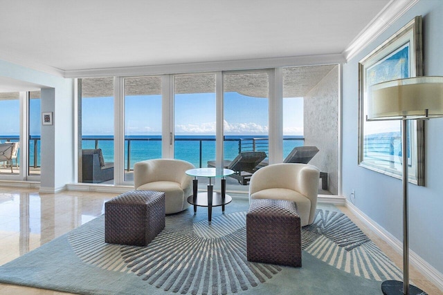 sunroom featuring a wealth of natural light and a water view