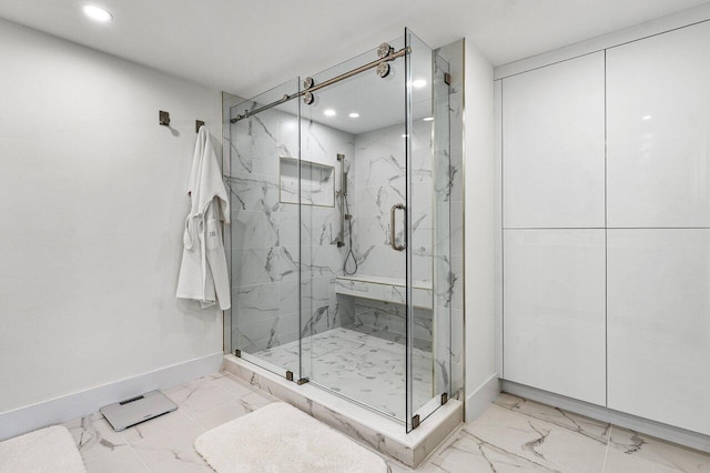 2727 S Ocean Blvd Unit 701, Highland Beach, FL 33487 - full bathroom with marble look tile flooring, baseboards, recessed lighting, and a marble finish shower