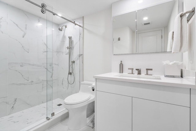 bathroom featuring toilet, walk in shower, and vanity