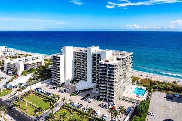 aerial view with a view of the beach and a water view