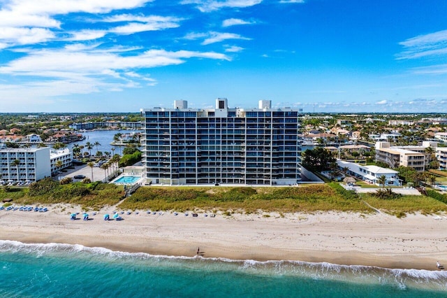 bird's eye view with a view of the beach and a water view