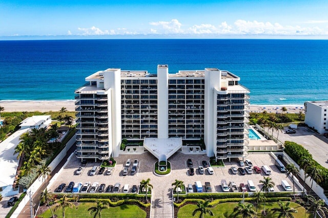 aerial view with a beach view and a water view