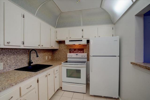 kitchen featuring backsplash, sink, white cabinets, and white appliances