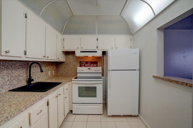 kitchen featuring white cabinetry, sink, white appliances, decorative backsplash, and light tile patterned floors