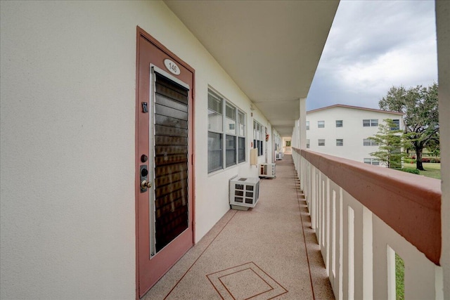 balcony featuring a wall unit AC