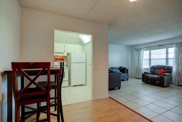 dining room featuring light hardwood / wood-style floors