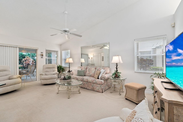 living room featuring carpet flooring, ceiling fan, and high vaulted ceiling