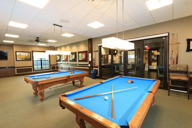 game room featuring ceiling fan, dark colored carpet, a drop ceiling, and billiards