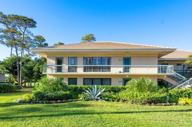 view of property featuring stairway