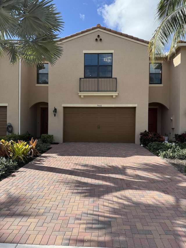 view of front of property with a garage