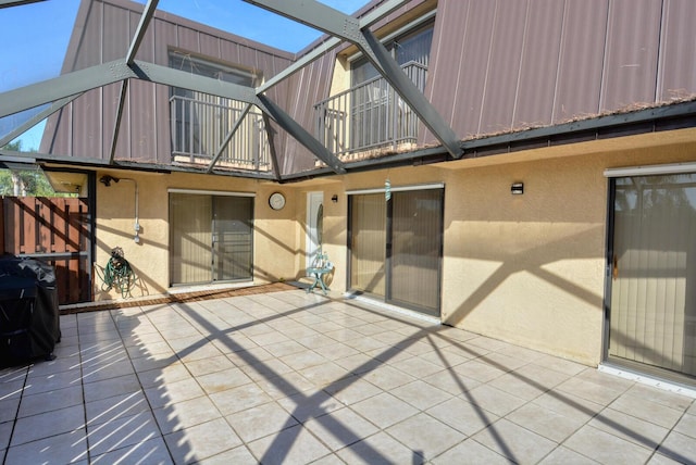 exterior space featuring a balcony and grilling area