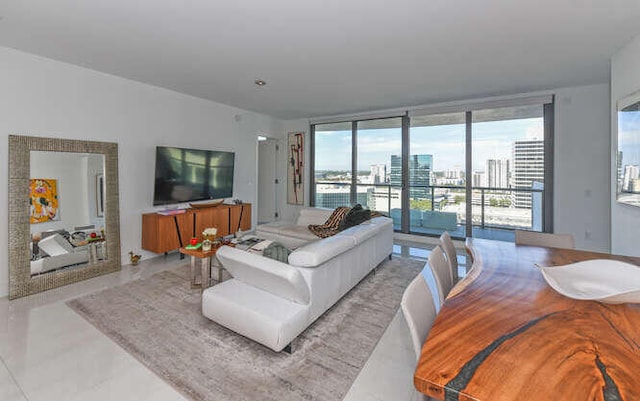 living room featuring a wall of windows