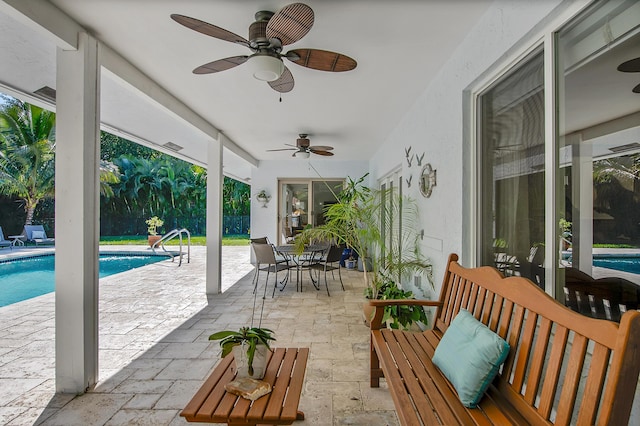 view of patio with ceiling fan