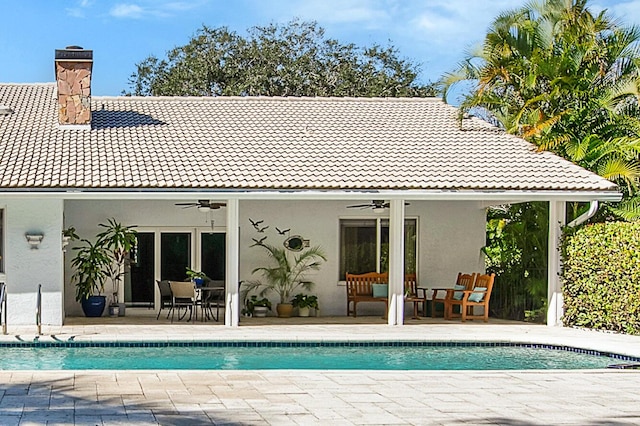 back of house with a patio and ceiling fan