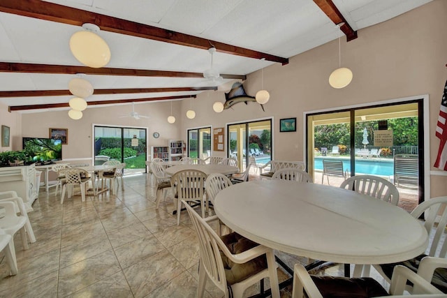 dining room featuring ceiling fan, beam ceiling, and high vaulted ceiling