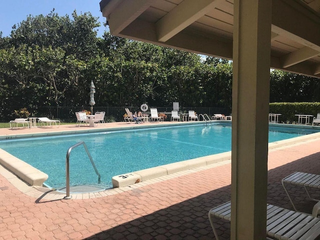 view of swimming pool featuring a patio