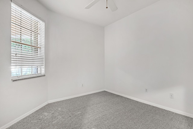 carpeted empty room with ceiling fan