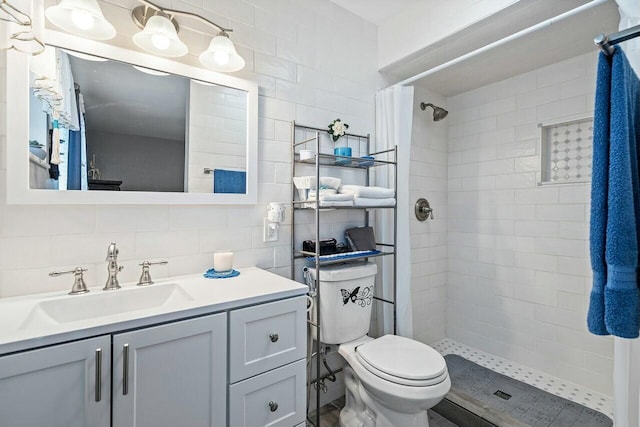 bathroom featuring curtained shower, toilet, decorative backsplash, vanity, and tile walls