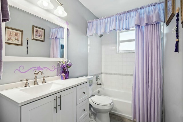 full bathroom featuring vanity, toilet, and shower / bath combo