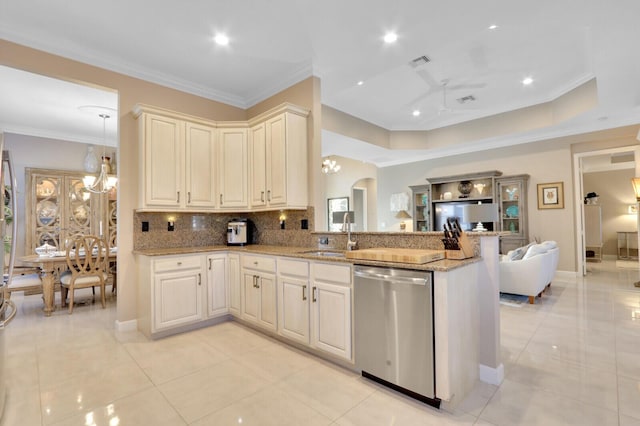 kitchen with kitchen peninsula, tasteful backsplash, stainless steel dishwasher, crown molding, and sink