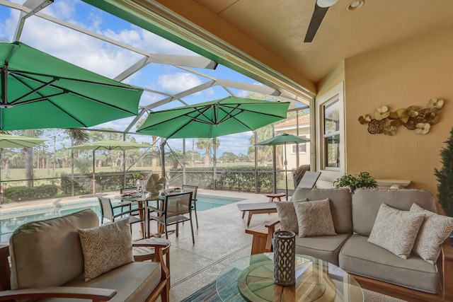 view of patio with outdoor lounge area and a lanai