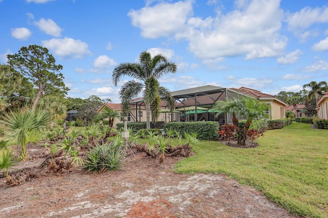 view of yard with a lanai