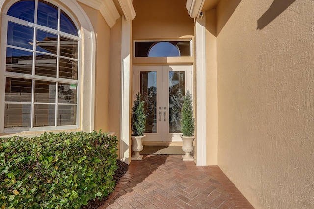 entrance to property featuring french doors