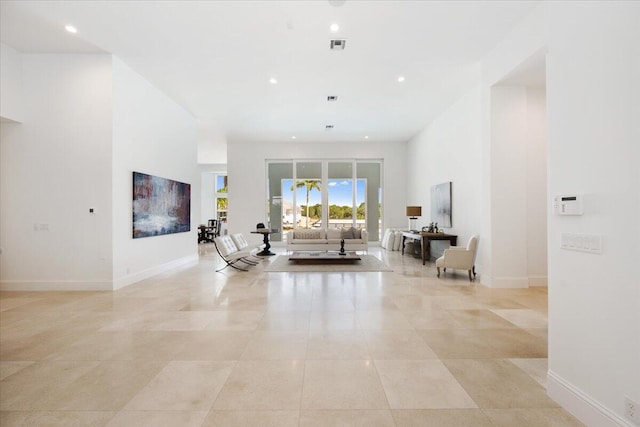 living room with light tile patterned flooring