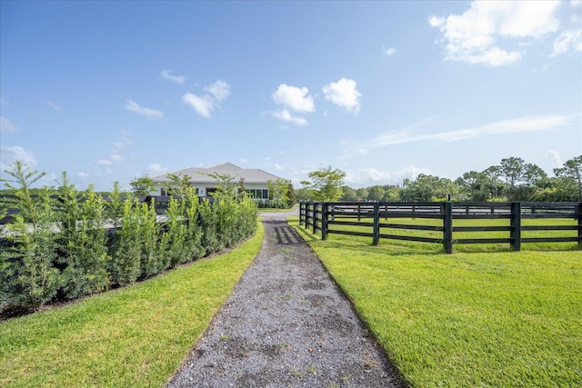 view of yard with a rural view