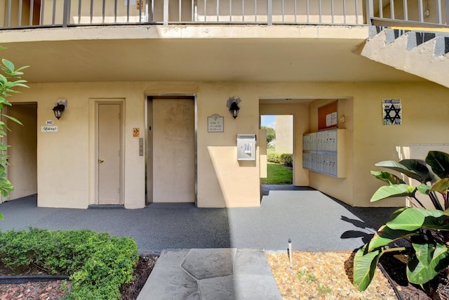 view of exterior entry featuring elevator