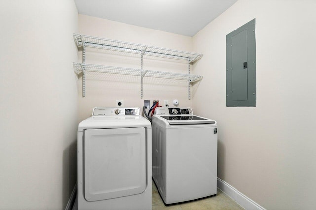 washroom featuring separate washer and dryer and electric panel