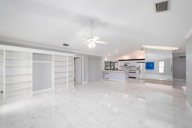 unfurnished living room featuring ceiling fan, built in features, ornamental molding, and vaulted ceiling