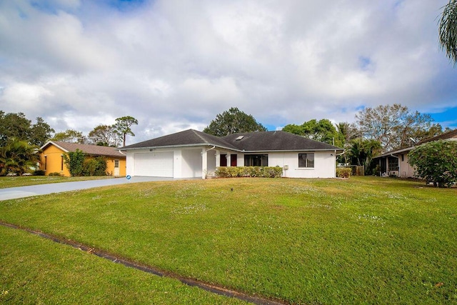 ranch-style home with a front lawn and a garage