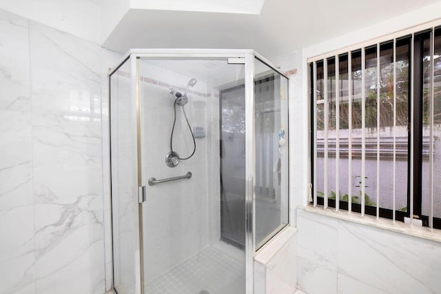 bathroom featuring walk in shower