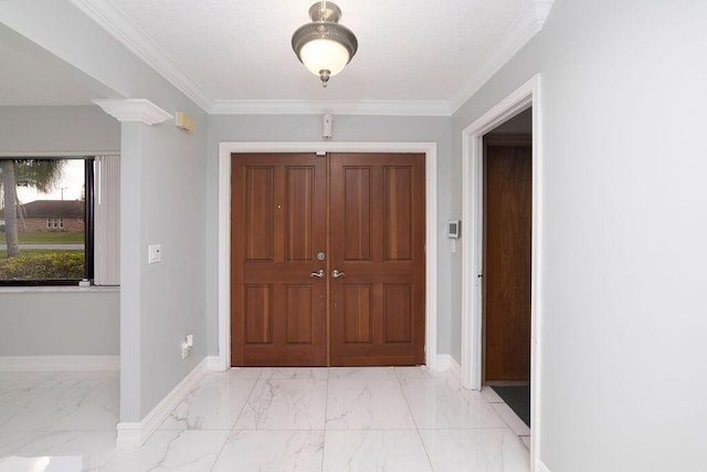 entryway with crown molding