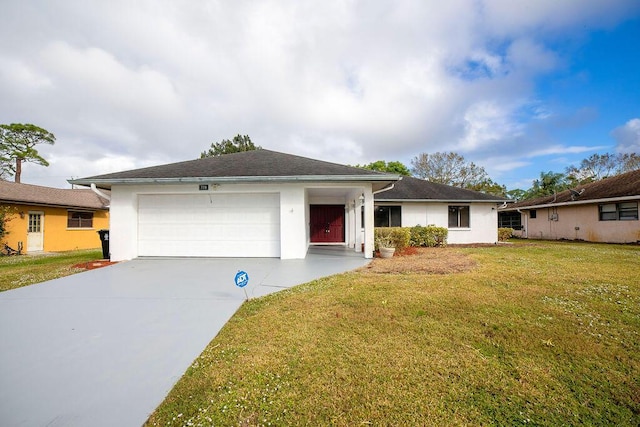 ranch-style home with a garage and a front yard