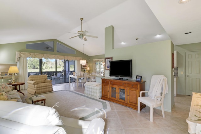 living room featuring ceiling fan, light tile patterned flooring, and lofted ceiling