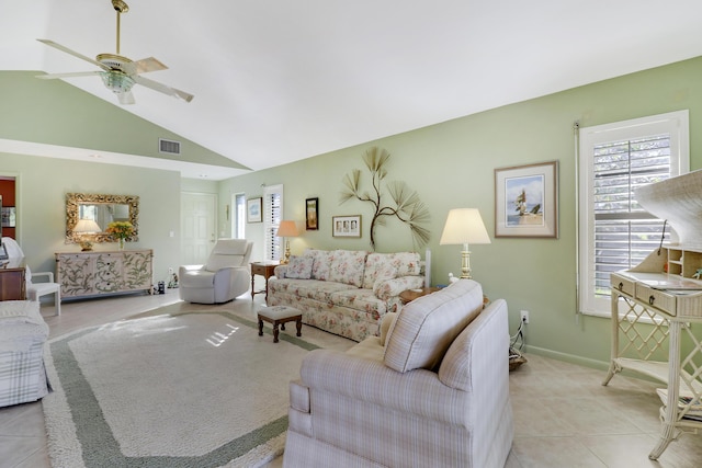 living room featuring light tile patterned floors, ceiling fan, and lofted ceiling